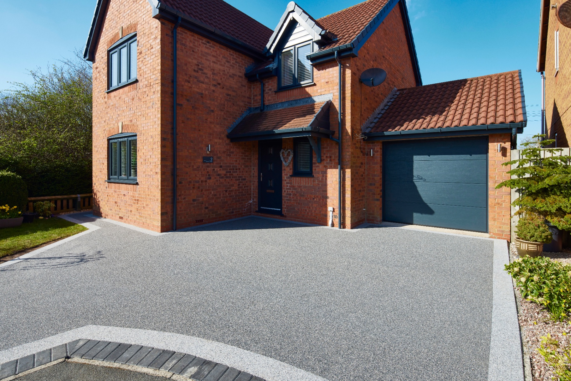 Wide shot of Vuba Stone driveway leading to home
