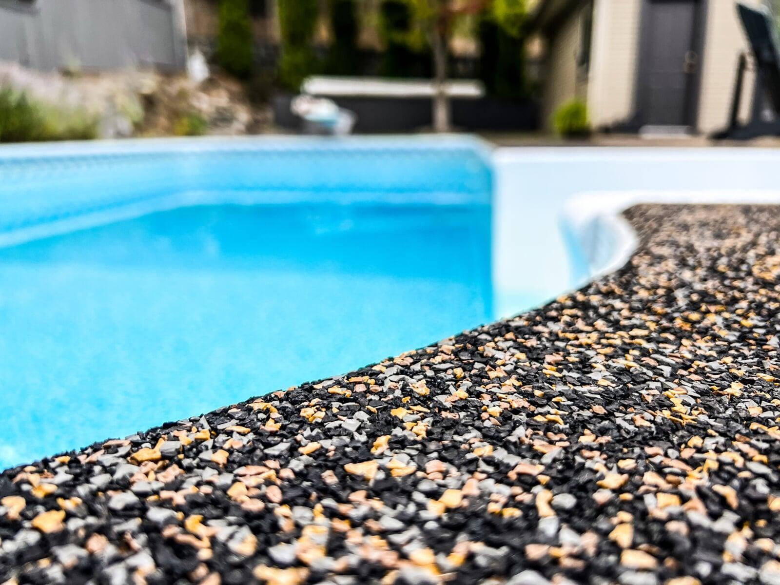 Rubber Stone pool deck installation