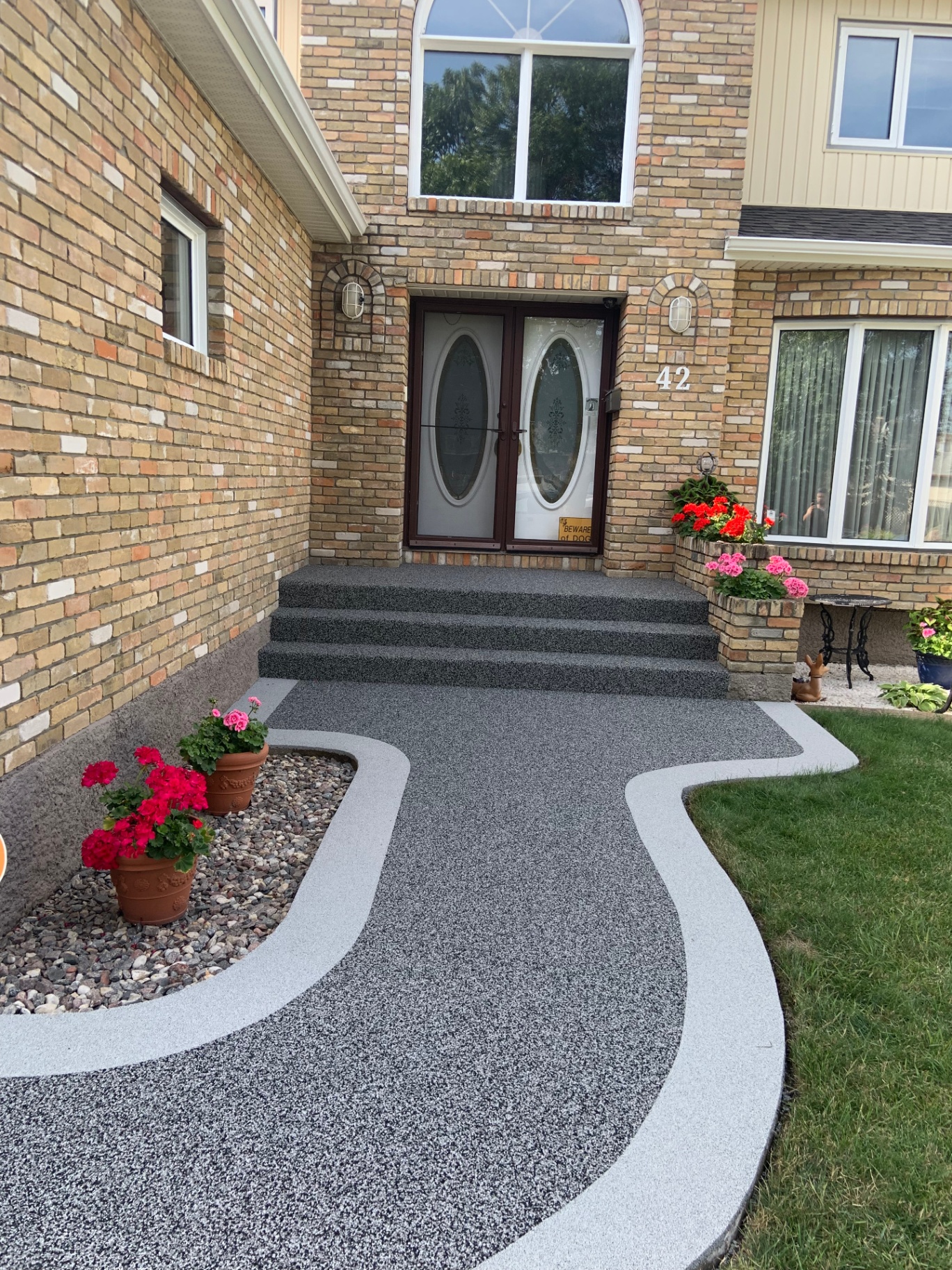 Vuba Stone front walkway leading to home entrance